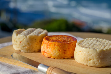 Variety of goat, sheep, cow cheeses made with paprika, herbs in Portugal