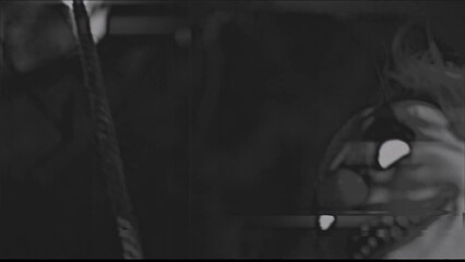 VINTAGE-LOOKING FOOTAGE OF A CREEPY MECHANICAL CLOWN ON A SWING.  FULL HD.