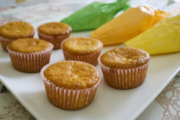 homemade yellow and green colored cupcakes