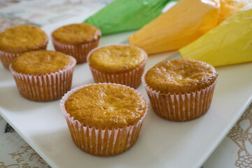 homemade yellow and green colored cupcakes