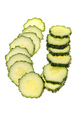 Slices of green cucumber on white background