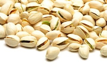 Many pistachio on white background