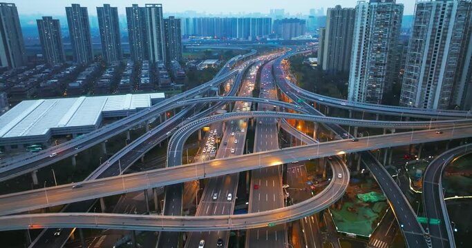 Aerial cityscape of traffic on the overpass road at Chengdu flyover rush hours cars busy driving at evening