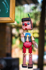 wooden doll with a doll