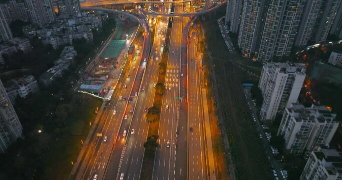 Aerial cityscape of traffic on the overpass road at Chengdu flyover rush hours cars busy travel at evening night