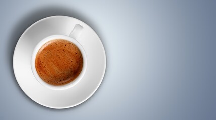 Ceramic cup of sweet coffee on the desk