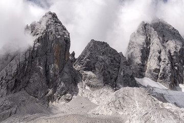 Close up on the epic cliffs on the peak of Yulong (Jade Dragon) Snow Mountain in Lijiang, Yunnan...