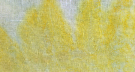 
Texture and pattern of natural leaf in yellow color from eco print process. Eco-printing is a technique where plants, leaves and flowers leave shapes, color and marks on fabric background. 