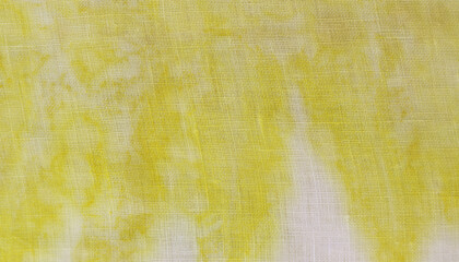 Texture and pattern of natural leaf in yellow color from eco print process. Eco-printing is a technique where plants, leaves and flowers leave shapes, color and marks on fabric background. 