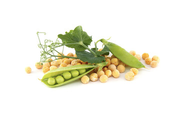 Dry peas and sweet green peas with leaves on white