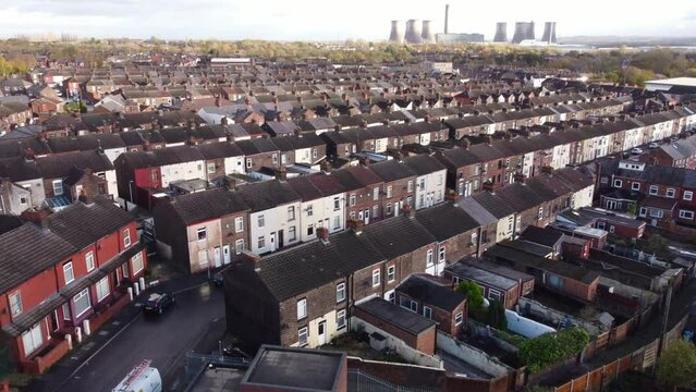 Rows of North West England terrace townhouse rooftops in industrial working class neighbourhood