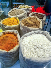 Indian spices and rice in spice sacks - Indian cuisine