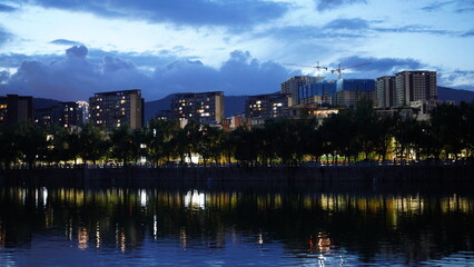 The bluetime city view with the lights on at night