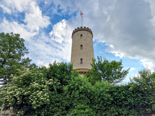 Sparrenburg Bielefeld with tower and walls under a nice cloudy blue sky