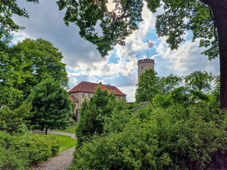 Fototapeta na wymiar Sparrenburg Bielefeld with tower and walls under a nice cloudy blue sky