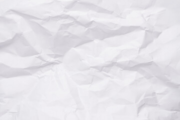 White crumpled paper texture background, clean white wrinkled paper, top view.