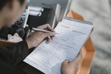 Employees fired or resigned from the company are writing job applications form. Unemployed, hiring...