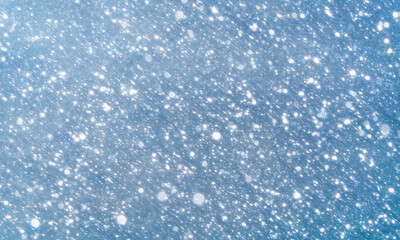 snow winter bokeh glow blue background for Christmas wallpaper