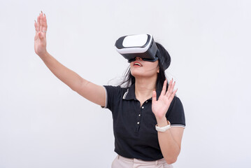 A young woman discovers a cgi environment via a virtual reality headset. Isolated on a white backdrop.