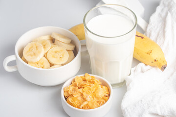 Cornflakes breakfast, banana, fresh milk, healthy food