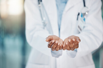 Hand, healthcare and mockup with the hands of a woman doctor holding space for marketing and advertising. Medicine, medical and product with a female surgeon in a hospital for health and wellness