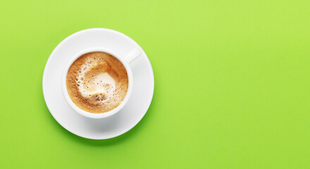 Espresso coffee on green background