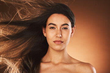 Hair care, beauty and portrait of woman in studio with healthy, long and straight hair style....