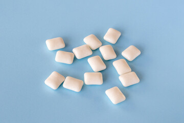 Chewing gum lying on a blue background