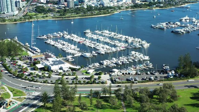 Aerial view of Southport Yacht Club on the Gold Coast Broadwater, Million dollar boats at exclusive marina, Summers day