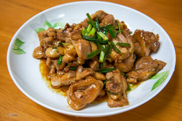A delicious Chinese home-cooked dish, stir-fried chicken thigh with sauce