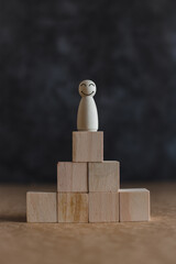 HRM or Human Resource Management, Magnifier glass focus to manager icon which is among staff icons...