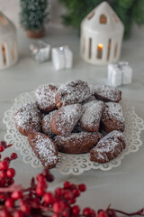 sweet home made chocolate christmas cookies on a christmas table