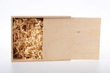 Wooden square boxes with closed sliding lid on white grey background