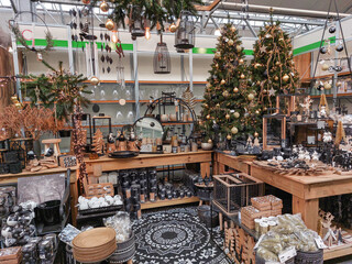 A mass of Christmas goods on the shelves in the store before the holidays