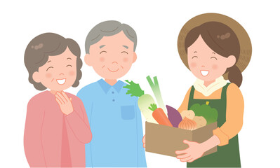 冬野菜の段ボールを持つ女性とシニア夫婦 