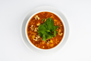 soup with grits on a white background