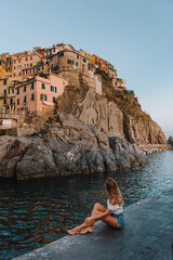 Fototapeta na wymiar Tourist at Manarola Cinque Terre Italy