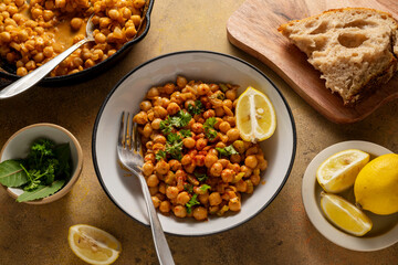 Cooked Chickpea dish with curry and spices, homemade vegan chickpeas, healthy food