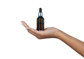 Shot of a young woman taking serum from a dropper against an isolated on a transparent PNG background.