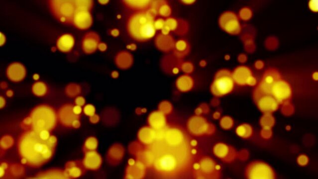 Beautiful festive bokeh effect, orange gold circles of light shining falling falling glowing christmas new year on black background. Abstract background. Screensaver, video in high quality 4k