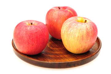 Naklejka na ściany i meble red apples on a wooden table