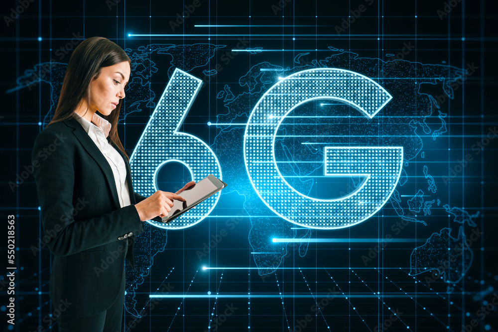 Poster side view of young businesswoman using tablet with glowing 6g hologram with map on blurry background
