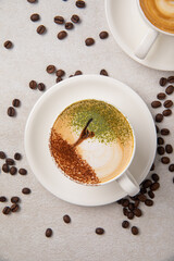 Top view on cup of cappuccino coffee with tree art
