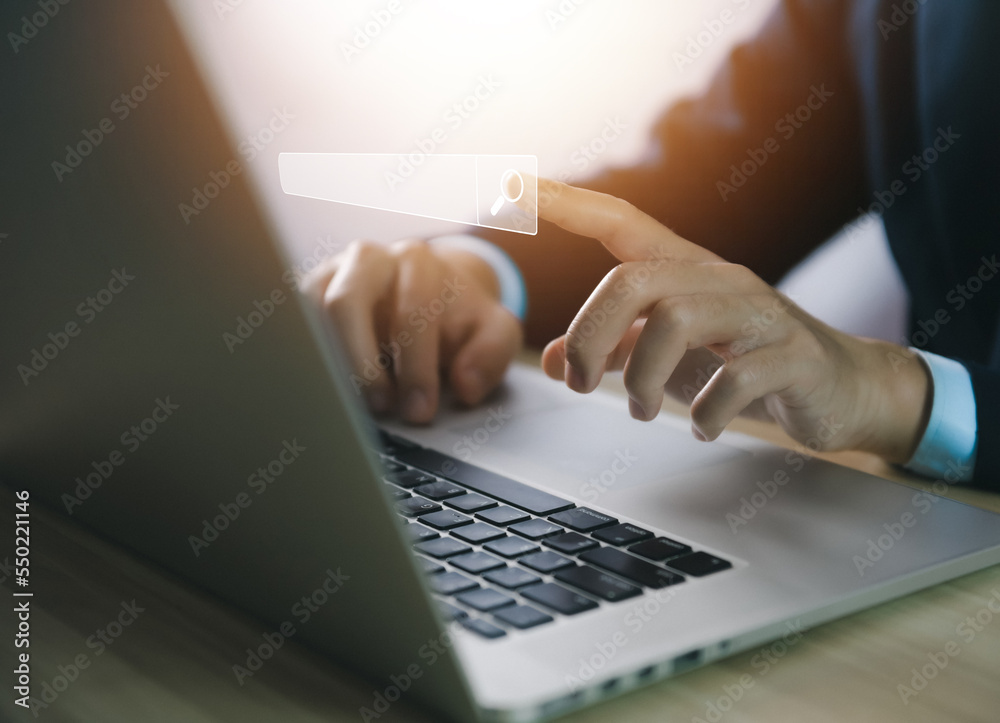 Wall mural businessman show their entry into digital technology by searching for information in internet browse