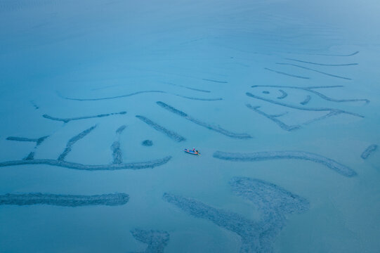 Aerial View Of Fisherman Fishing On A Lake in Xiapu, China 