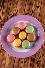Close-up of macarons cakes of different colors .Culinary and cooking concept. Tasty colorful macaroons.