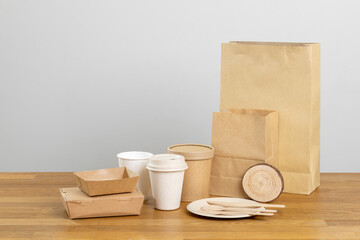 Eco friendly food packaging. Paper recycling zero waste natural products. A box of paper for food disposable catering of nature and recycling concept. Plastic free set on background.