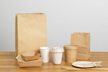 Eco friendly food packaging. Paper recycling zero waste natural products. A box of paper for food disposable catering of nature and recycling concept. Plastic free set on background.