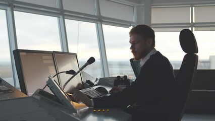 Workplace of the air traffic controllers in the control tower. Realtime