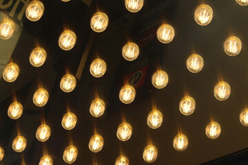 Hollywood, show business light bulbs installed on a ceiling of a pub